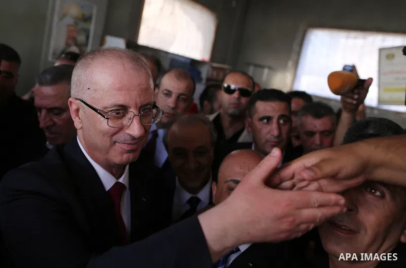 Palestinian Prime Minister Rami Hamdallah visits a house of Palestinian family at Shejaiya neighborhood in Gaza City on October 2, 2017. Palestinian prime minister Rami Hamdallah arrived in Gaza for his first visit in tw...