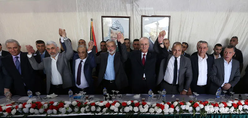 From L to R: Hamas's leader in the Gaza Strip Yahya Sinwar, Director of Palestinian General Intelligence in the West Bank Majid Faraj, Hamas' overall leader Ismail Haniya, Palestinian Prime Minister Rami Hamdallah and an...