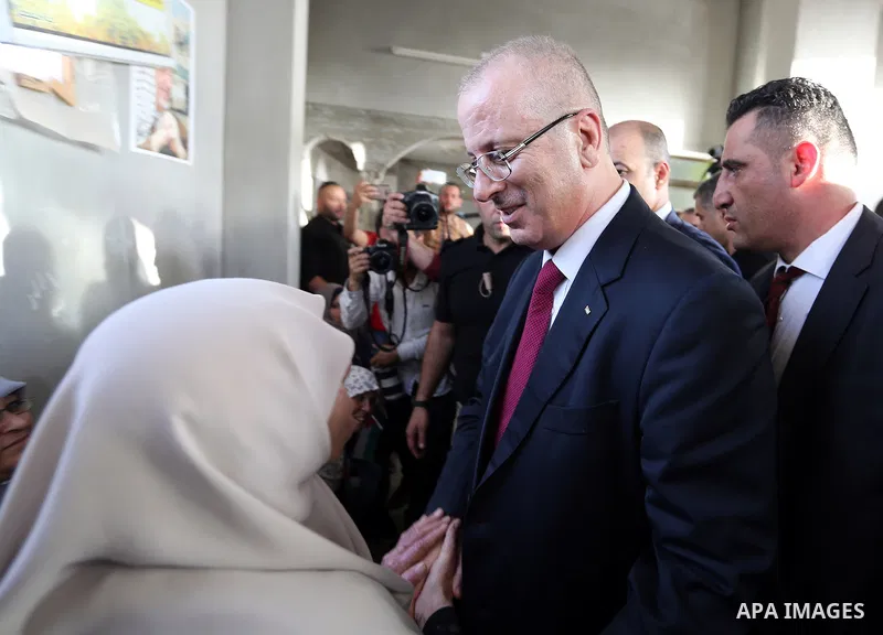 Palestinian Prime Minister Rami Hamdallah visits a Palestinian family house at Shejaiya neighborhood in Gaza City on October 2, 2017. Palestinian prime minister Rami Hamdallah arrived in Gaza for his first visit in two y...