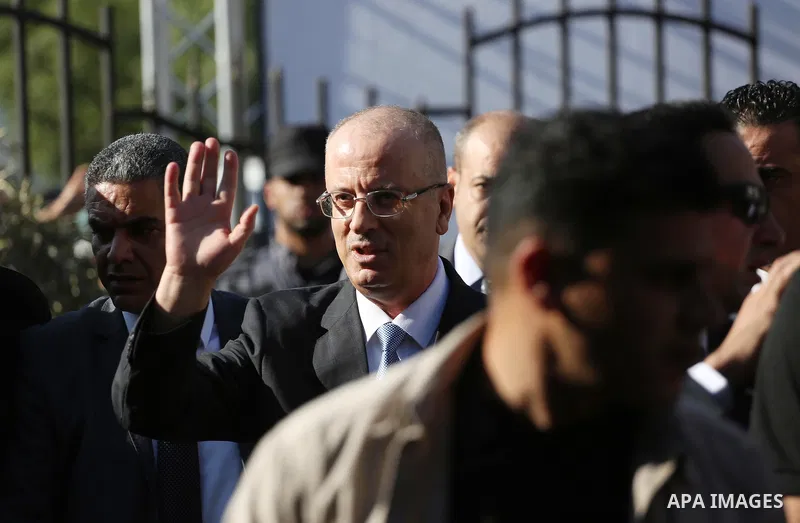 Palestinian Prime Minister Rami Hamdallah arrives before a reconciliation cabinet meeting in Gaza City on October 3, 2017. The Palestinian reconciliation government met in Gaza for the first time since 2014 as moves inte...