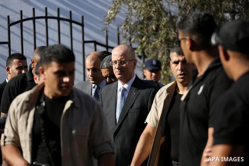 Palestinian Prime Minister Rami Hamdallah arrives before a reconciliation cabinet meeting in Gaza City on October 3, 2017. The Palestinian reconciliation government met in Gaza for the first time since 2014 as moves inte...