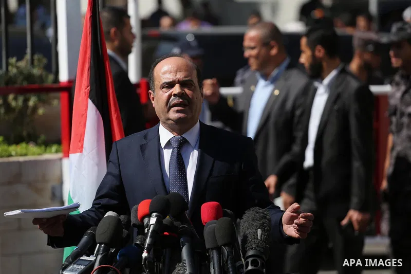 Spokesman for the Palestinian government, Yousef Al Mahmoud, speaks to media following a reconciliation cabinet meeting in Gaza City on October 3, 2017. The Palestinian reconciliation government met in Gaza for the first...