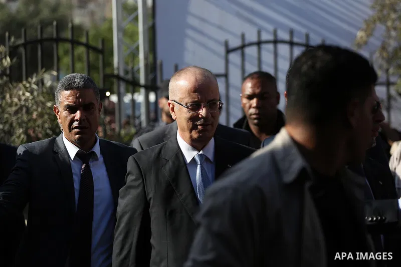 Palestinian Prime Minister Rami Hamdallah arrives before a reconciliation cabinet meeting in Gaza City on October 3, 2017. The Palestinian reconciliation government met in Gaza for the first time since 2014 as moves inte...
