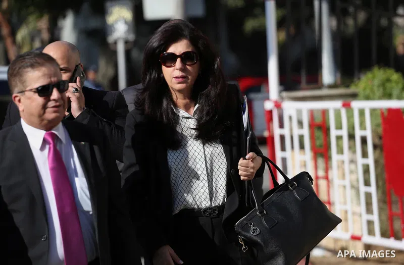 Palestinian Minister of Health Jawad Awwad and Palestinian Minister for Tourism and Antiquities, Rula Maaya arrive before a reconciliation cabinet meeting in Gaza City on October 3, 2017. The Palestinian reconciliation g...