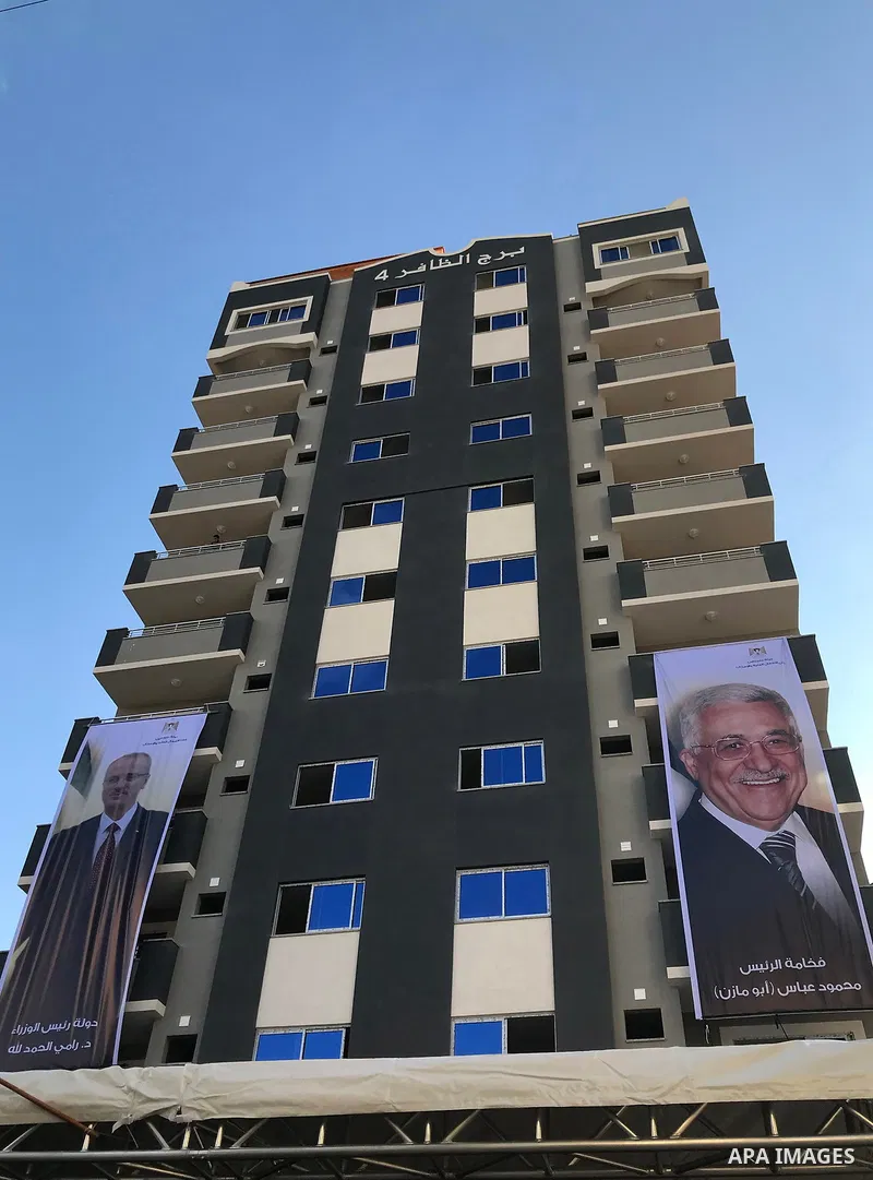 A picture shows Al-Zafer building, during the opening ceremony, which was destroyed during the recent Israeli war on Gaza Strip, in Gaza city on October 3, 2017. Photo by Alaa Sarraj