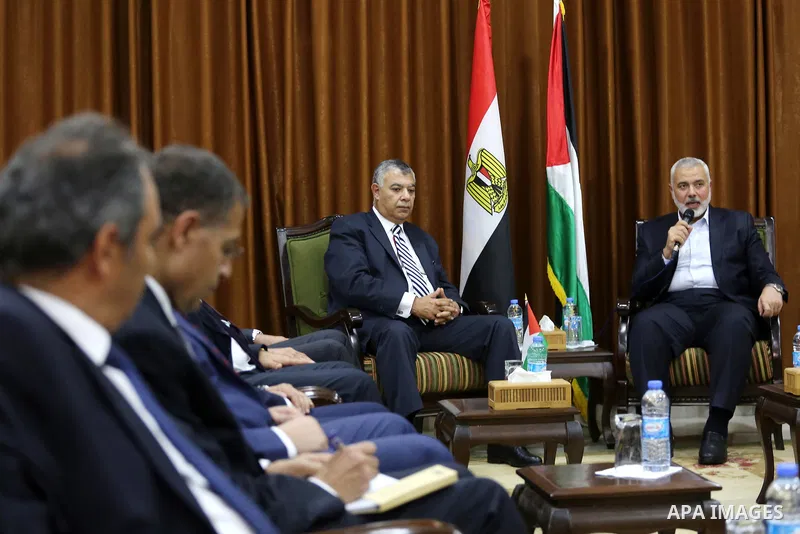Palestinian Hamas Chief Ismail Haniyeh meets with Egyptian Intelligence Minister Khalid Fawzi at his office in Gaza City on October 3, 2017. Photo by Mohammed Asad