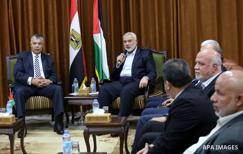 Palestinian Hamas Chief Ismail Haniyeh meets with Egyptian Intelligence Minister Khalid Fawzi at his office in Gaza City on October 3, 2017. Photo by Mohammed Asad