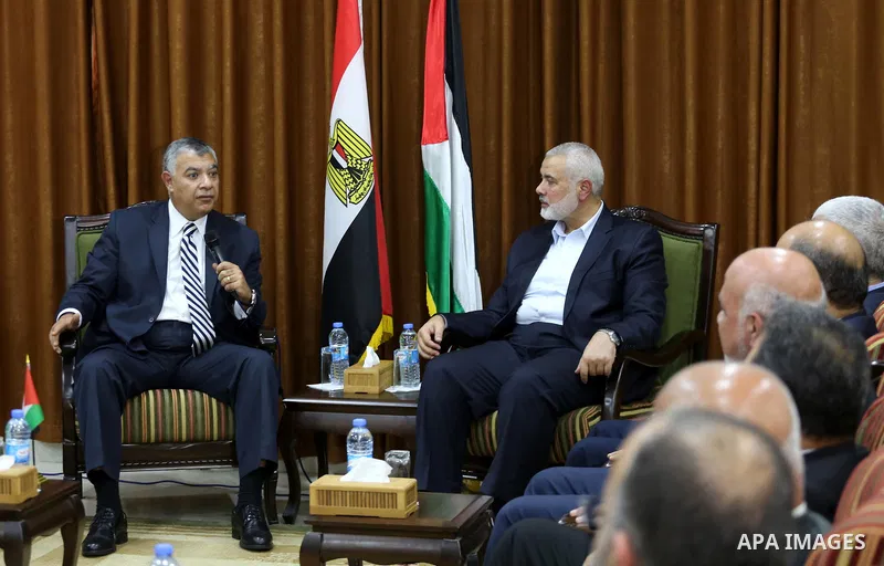 Palestinian Hamas Chief Ismail Haniyeh meets with Egyptian Intelligence Minister Khalid Fawzi at his office in Gaza City on October 3, 2017. Photo by Mohammed Asad