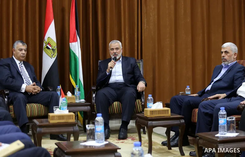 Palestinian Hamas Chief Ismail Haniyeh meets with Egyptian Intelligence Minister Khalid Fawzi at his office in Gaza City on October 3, 2017. Photo by Mohammed Asad