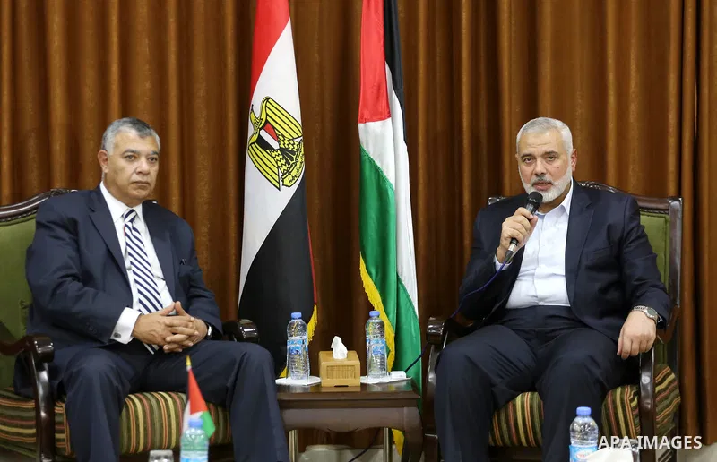 Palestinian Hamas Chief Ismail Haniyeh meets with Egyptian Intelligence Minister Khalid Fawzi at his office in Gaza City on October 3, 2017. Photo by Mohammed Asad