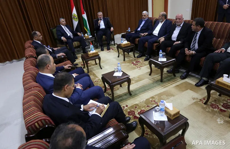 Palestinian Hamas Chief Ismail Haniyeh meets with Egyptian Intelligence Minister Khalid Fawzi at his office in Gaza City on October 3, 2017. Photo by Mohammed Asad