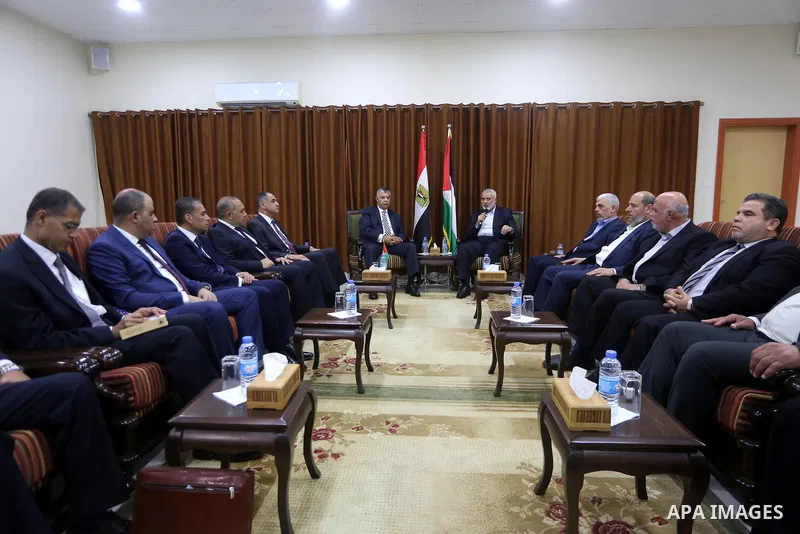 Palestinian Hamas Chief Ismail Haniyeh meets with Egyptian Intelligence Minister Khalid Fawzi at his office in Gaza City on October 3, 2017. Photo by Mohammed Asad