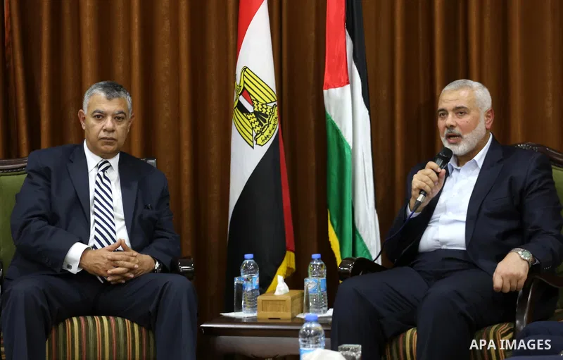 Palestinian Hamas Chief Ismail Haniyeh meets with Egyptian Intelligence Minister Khalid Fawzi at his office in Gaza City on October 3, 2017. Photo by Mohammed Asad