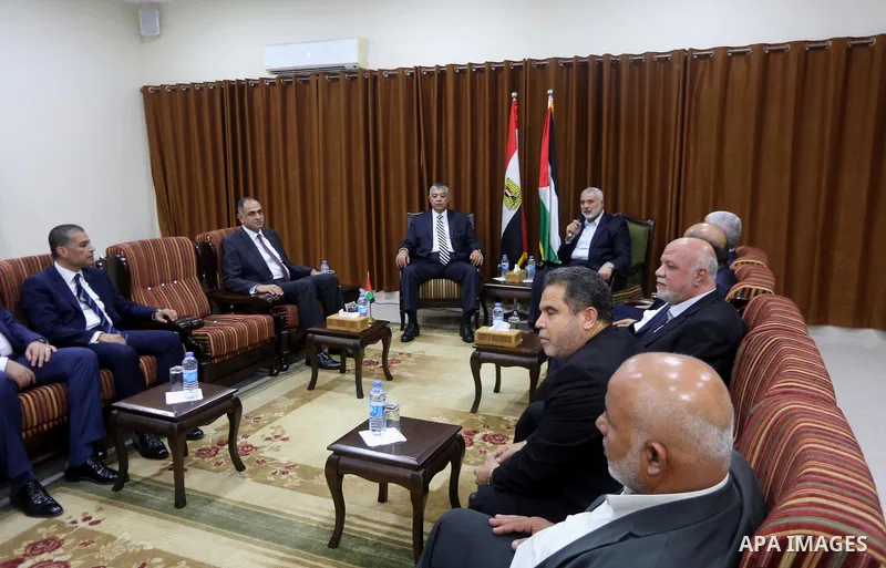 Palestinian Hamas Chief Ismail Haniyeh meets with Egyptian Intelligence Minister Khalid Fawzi at his office in Gaza City on October 3, 2017. Photo by Mohammed Asad