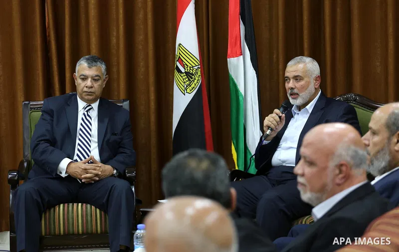 Palestinian Hamas Chief Ismail Haniyeh meets with Egyptian Intelligence Minister Khalid Fawzi at his office in Gaza City on October 3, 2017. Photo by Mohammed Asad