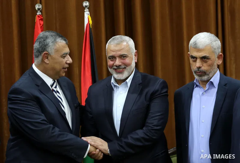 Palestinian Hamas Chief Ismail Haniyeh meets with Egyptian Intelligence Minister Khalid Fawzi at his office in Gaza City on October 3, 2017. Photo by Mohammed Asad