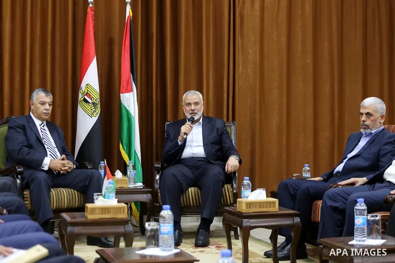 Palestinian Hamas Chief Ismail Haniyeh meets with Egyptian Intelligence Minister Khalid Fawzi at his office in Gaza City on October 3, 2017. Photo by Mohammed Asad