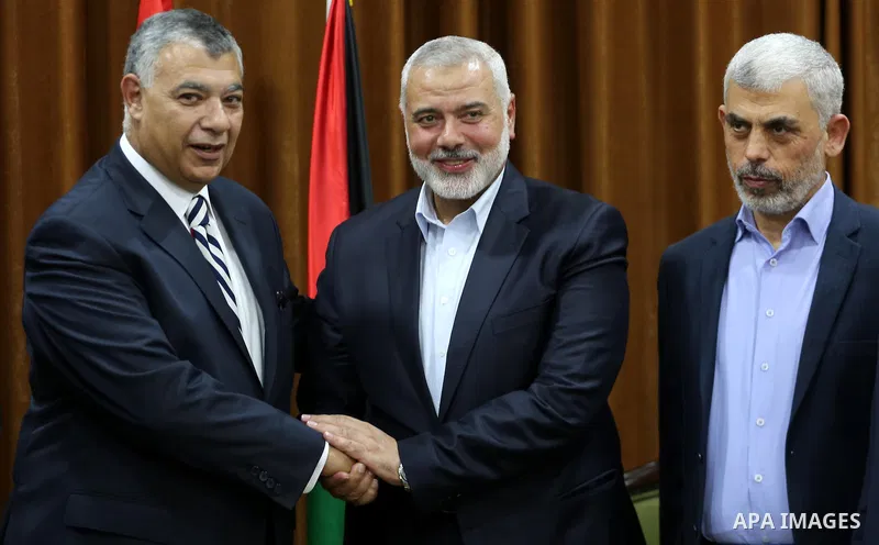 Palestinian Hamas Chief Ismail Haniyeh meets with Egyptian Intelligence Minister Khalid Fawzi at his office in Gaza City on October 3, 2017. Photo by Mohammed Asad