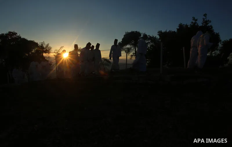 Samaritans pray on top of Mount Gerizim near the northern West Bank city of Nablus on October 4, 2017 during the holiday of Sukkot (Tabernacles) celebrations. Sukkot marks the exodus of the ancient Hebrew people from Egy...