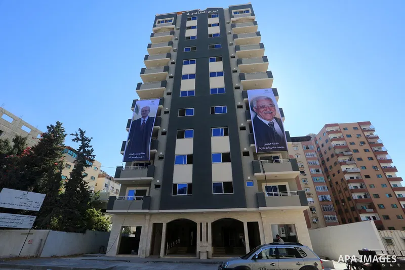 A general view shows al-Zafer building which was destroyed during the recent Israeli war on Gaza Strip After being rebuilt in Gaza city on October 4, 2017. Photo by Atia Darwish