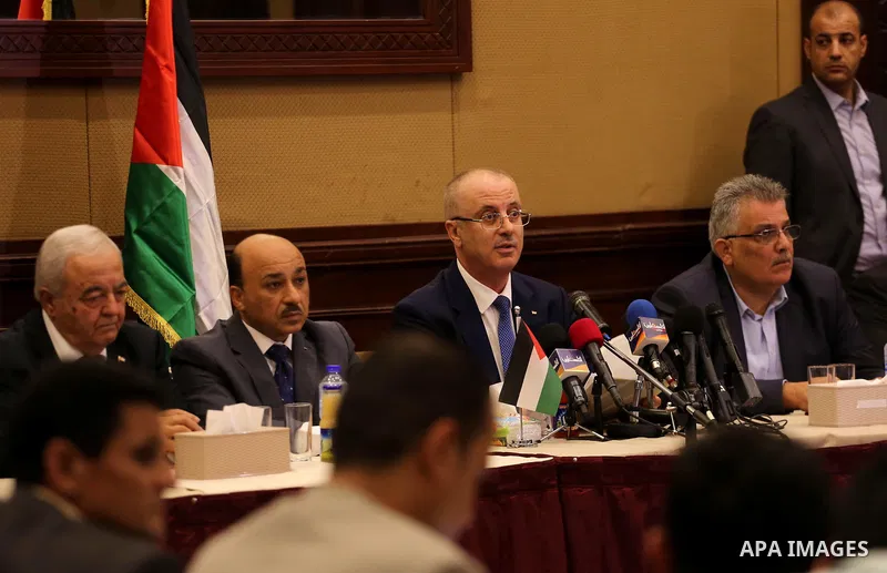 Palestinian Prime Minister Rami Hamdallah meets with Palestinian youths in Gaza city on October 4, 2017. For three days it was all smiles as the Palestinian prime minister held talks in Gaza with Hamas but as the symboli...