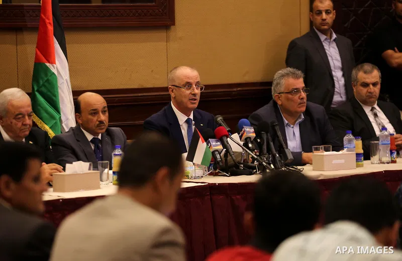 Palestinian Prime Minister Rami Hamdallah meets with Palestinian youths in Gaza city on October 4, 2017. For three days it was all smiles as the Palestinian prime minister held talks in Gaza with Hamas but as the symboli...