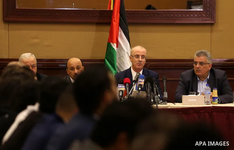 Palestinian Prime Minister Rami Hamdallah meets with Palestinian youths in Gaza city on October 4, 2017. For three days it was all smiles as the Palestinian prime minister held talks in Gaza with Hamas but as the symboli...