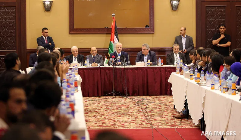 Palestinian Prime Minister Rami Hamdallah meets with Palestinian youths in Gaza city on October 4, 2017. For three days it was all smiles as the Palestinian prime minister held talks in Gaza with Hamas but as the symboli...