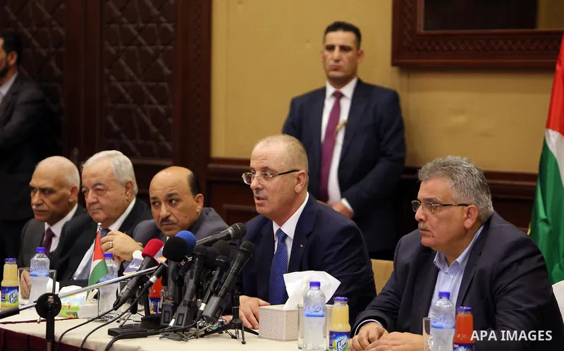 Palestinian Prime Minister Rami Hamdallah meets with Palestinian youths in Gaza city on October 4, 2017. For three days it was all smiles as the Palestinian prime minister held talks in Gaza with Hamas but as the symboli...