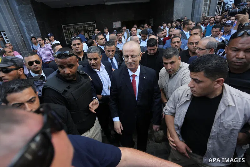 Palestinian prime minister Rami Hamdallah visits patients at Gaza City's Al-Shifa hospital on October 5, 2017. For three days it was all smiles as the Palestinian prime minister held talks in Gaza with Hamas but as the s...