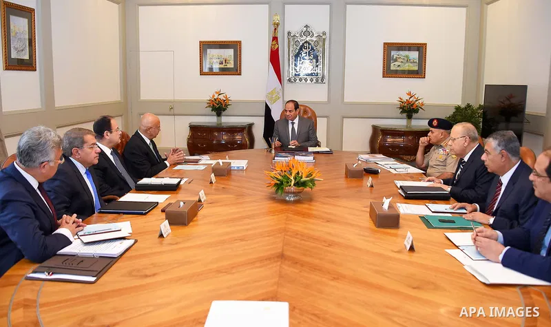 Egyptian President Abdel Fattah al-Sisi meets with Prime Minister Sharif Ismail in Cairo, Egypt, on October 8, 2017. Photo by Egyptian President Office