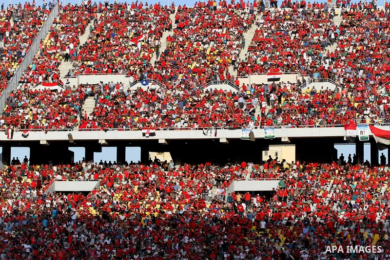 Supporters of Egypt attend the World Cup 2018 Africa qualifying football match between Egypt and Congo at the Borg al-Arab stadium in Alexandria on October 8, 2017. Photo by Amr Sayed