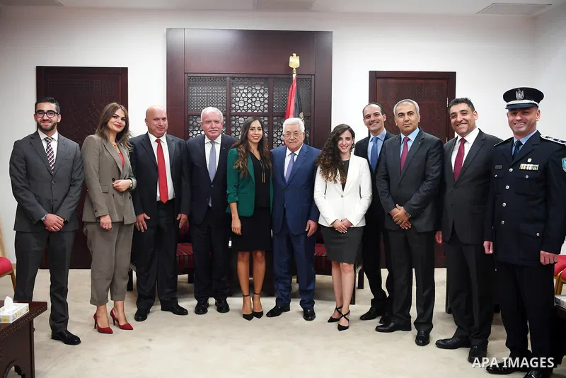 Palestinian President Mahmoud Abbas meets with Palestinian delegation that participated in Interpol meetings at his headquarter in the West Bank city of Ramallah on October 8, 2017. Photo by Thaer Ganaim