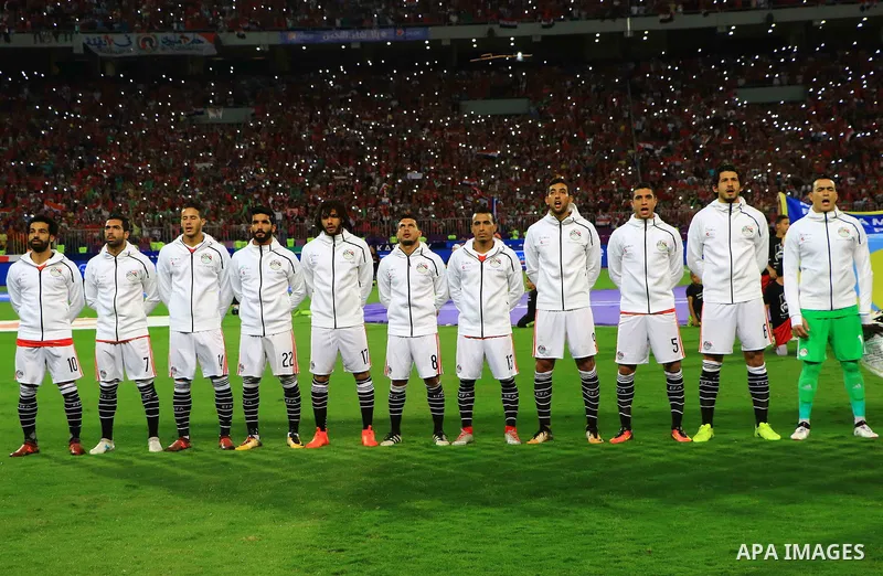 Egypt's team players sing their country's national anthem during their World Cup 2018 Africa qualifying match between Egypt and Congo at the Borg el-Arab stadium in Alexandria on October 8, 2017. Photo by Amr Sayed