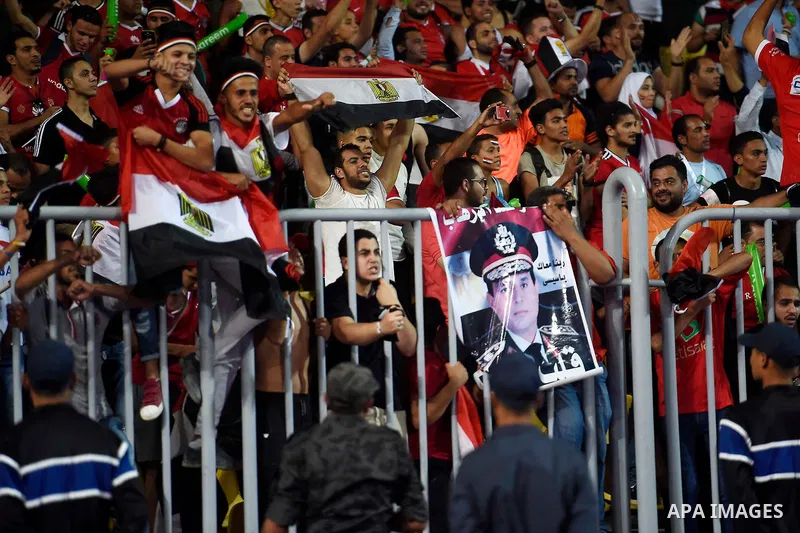 Supporters of Egypt celebrate after the 2018 FIFA World Cup qualification match between Egypt and Congo at the Borg El-Arab Stadium in Alexandria, Egypt, Oct. 8, 2017. Egypt won 2-1 and qualified to the World Cup finals....