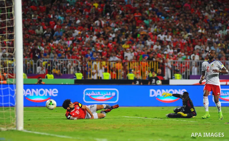 Egypt's team players celebrate wining after the 2018 FIFA World Cup qualification match between Egypt and Congo at the Borg El-Arab Stadium in Alexandria, Egypt, Oct. 8, 2017. Egypt won 2-1 and qualified to the World Cup...