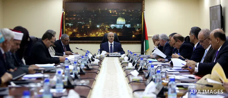 Palestinian Prime Minister, Rami Hamdallah, chairs a meeting of the Council of Ministers, in the West Bank city of Ramallah, on October 10, 2017. Photo by Prime Minister Office