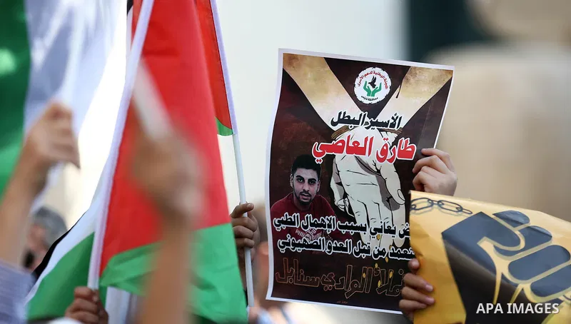 Palestinians take part in a protest to show solidarity with Palestinian prisoners held in Israeli jails, in the West Bank city of Nablus, on October 11, 2017. Photo by Ayman Ameen