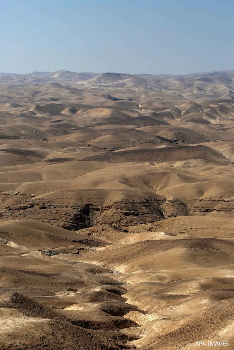 A picture taken on October 13, 2017 shows a series of limestone rocks in the Jerusalem wilderness (Wadi Ghar), in the east of the West Bank city of Bethlehem. Photo by Ayman Ameen