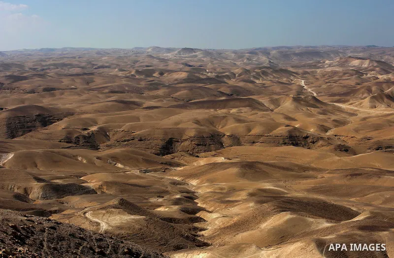 A picture taken on October 13, 2017 shows a series of limestone rocks in the Jerusalem wilderness (Wadi Ghar), in the east of the West Bank city of Bethlehem. Photo by Ayman Ameen