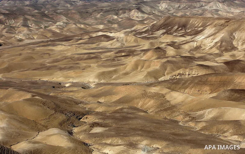 A picture taken on October 13, 2017 shows a series of limestone rocks in the Jerusalem wilderness (Wadi Ghar), in the east of the West Bank city of Bethlehem. Photo by Ayman Ameen