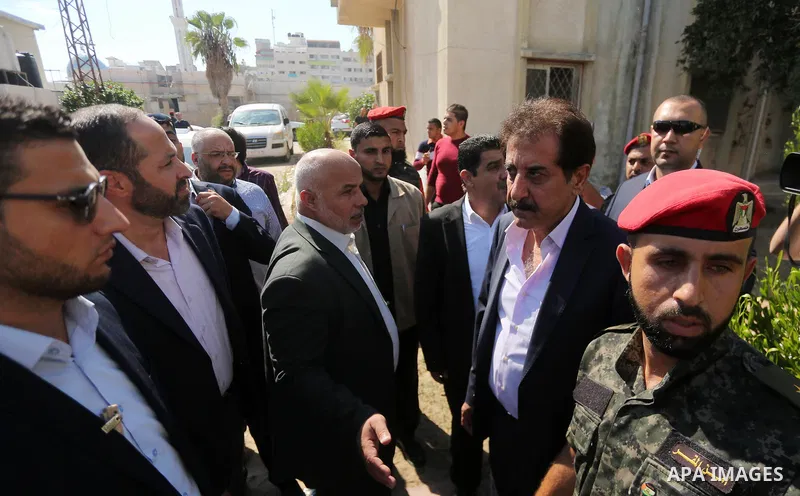 Chief of General Committee for Crossings and Borders in the Palestinian Authority, Nazmi Mohana visits the passenger registration service headquarter "Abu Khadra Governmental Complex" in Gaza city on October 16, 2017. Ph...