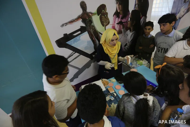 Palestinian students take part in a festival of the Science Days Palestine, at al Qattan Center in Gaza city on October 17, 2017. Photo by Mohammed Asad