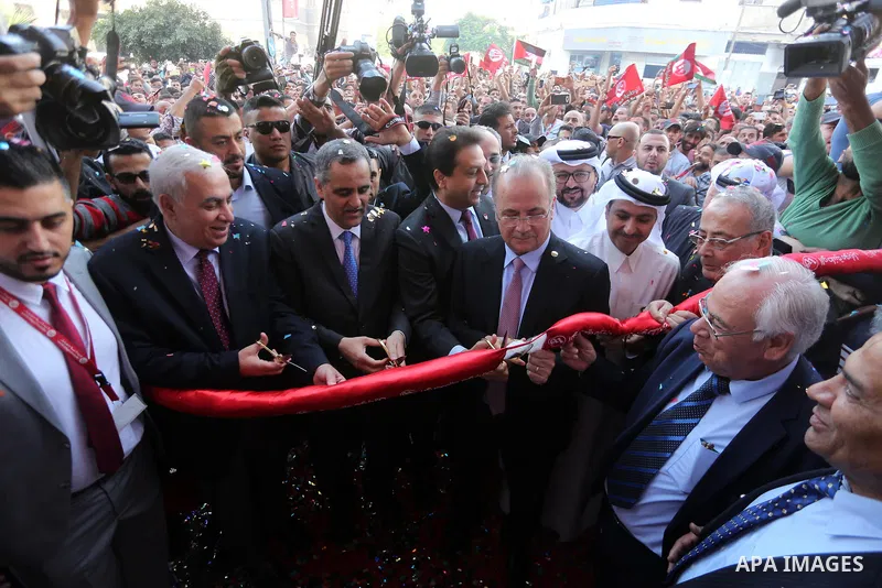Palestinians take part in the launching services ceremony of Al-Wataniya Mobile Palestine in Gaza City October 24, 2017. Palestinian company Wataniya Mobile announced that it will launch its telecommunications services i...