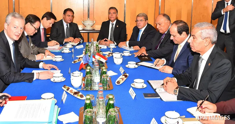 Egyptian President Abdel Fattah al-Sisi and French Economy Minister Bruno Le Maire attend a meeting with French business heads at the Ministry of Economy in Paris, France on October 25, 2017. Photo by Egyptian President...