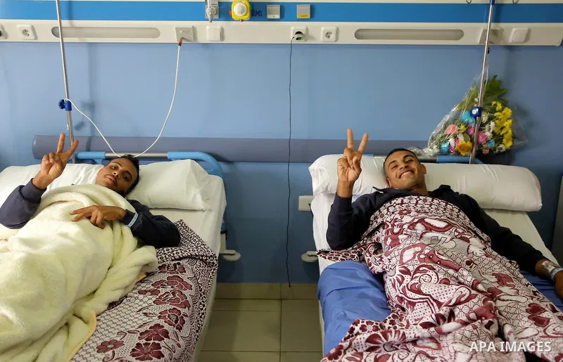 Egyptian policemen injured during the anti-terror shootout in the desert of Giza province receive medical treatment in a police hospital in Giza, Egypt, on Oct. 26, 2017. 16 policemen were killed and another went missing...