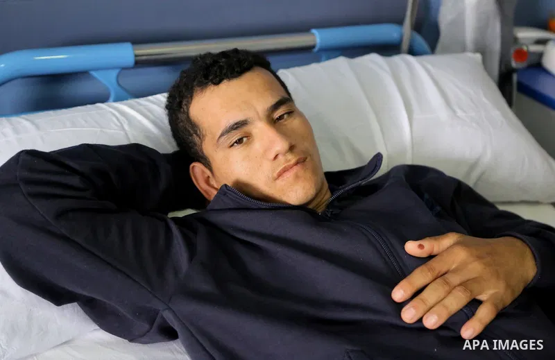 An Egyptian policeman injured during the anti-terror shootout in the desert of Giza province receives medical treatment in a police hospital in Giza, Egypt, on Oct. 26, 2017. 16 policemen were killed and another went mis...