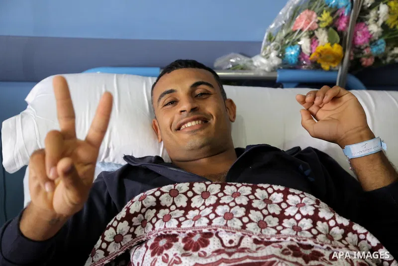 An Egyptian policeman injured during the anti-terror shootout in the desert of Giza province receives medical treatment in a police hospital in Giza, Egypt, on Oct. 26, 2017. 16 policemen were killed and another went mis...