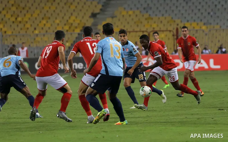 Egypt's Al-Ahly and Wydad Casablanca players compete during the CAF Champions League final football match between Al-Ahly vs Wydad Casablanca at the Borg El Arab Stadium in Alexandria on October 28, 2017. Photo by String...