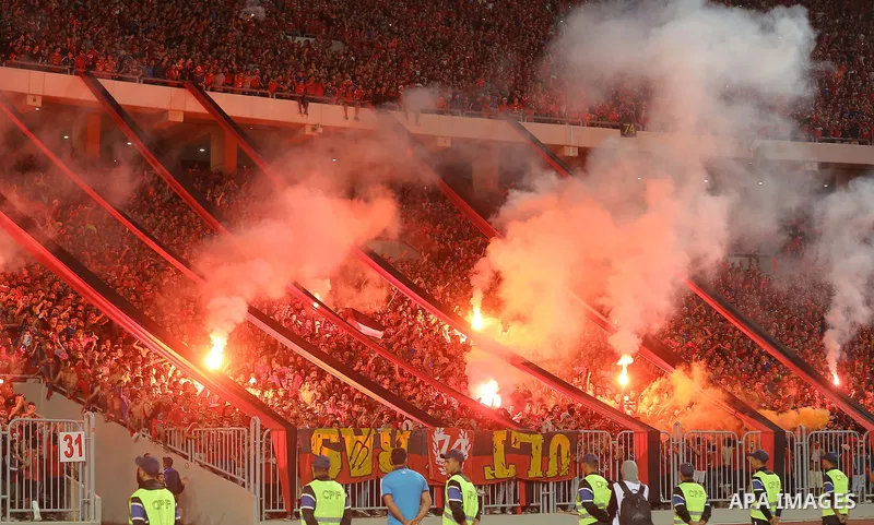Al-Ahly supporters cheer for their team during the CAF Champions League final football match between Al-Ahly vs Wydad Casablanca at the Borg El Arab Stadium in Alexandria on October 28, 2017. Photo by Stringer
